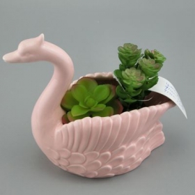 vaso da fioriera rosa con fioriera cigno