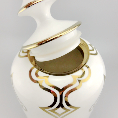 white ceramic jar with lid