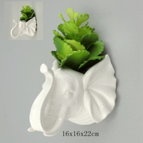 fioriera in ceramica a forma di elefante bianca