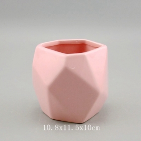 fioriera sfaccettata in ceramica rosa sfaccettata