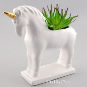 fioriera succulenta di unicorno con corno dipinto d'oro