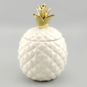 barattolo di ananas in porcellana bianca con coperchio