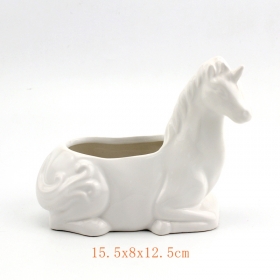 Piantatrice salvadanaio in ceramica bianca con unicorno